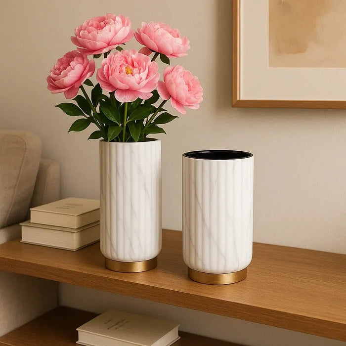 Set of Scandinavian-style ceramic vases with marble texture and gold accents, ideal for modern home decor. Displayed with greenery and a book for a clean, elegant interior look in U.S. homes